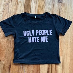 Black Graphic Tee with Lavender Text.